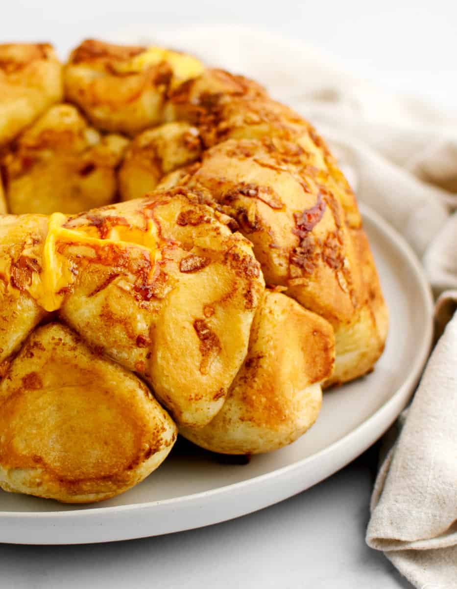Cheesy Onion Pull Apart Bread on Plate