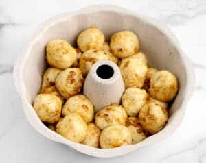 Cheesy Monkey Bread in Bundt Pan Before Baking