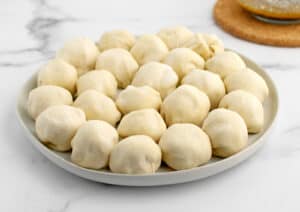 Stuffed Rolls on Plate on Marble Surface