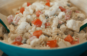 Refreshing cauliflower ranch summer salad recipe. Great for bbqs and potlucks. Learn how to make this delicious side salad.