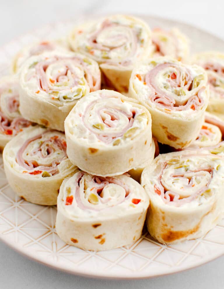 Green Olive, Ham and Cream Cheese Tortilla Rollups on Serving Platter