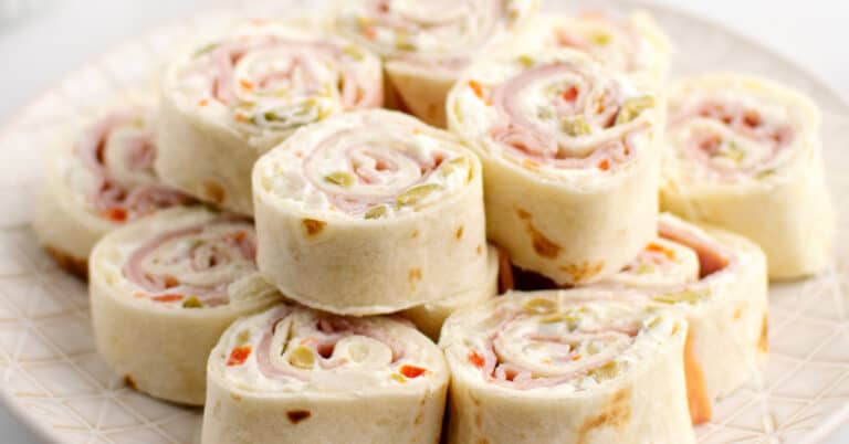 Green Olive, Ham and Cream Cheese Tortilla Rollups on Serving Platter