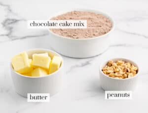 Chocolate Crunch Ingredients in Bowls on a White Marble Surface