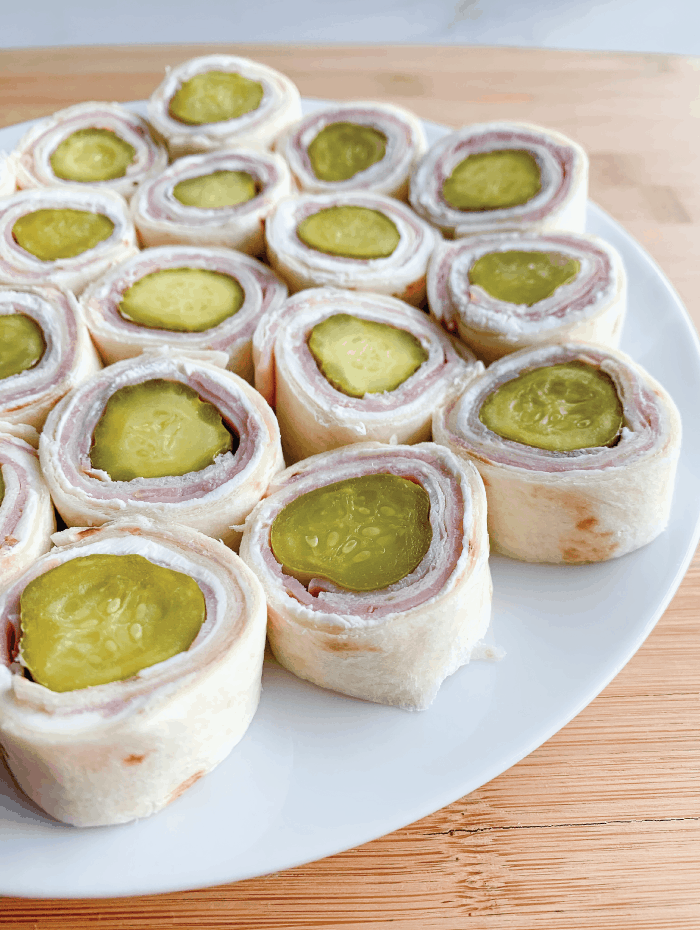 Pickle-Ham-and-Cream-Cheese-Rollups-Piled-On-Plate