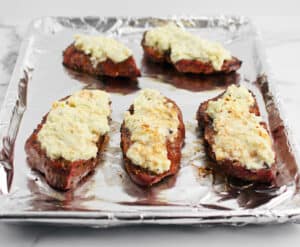 Broiled Gorgonzola Topping on Steaks on Pan