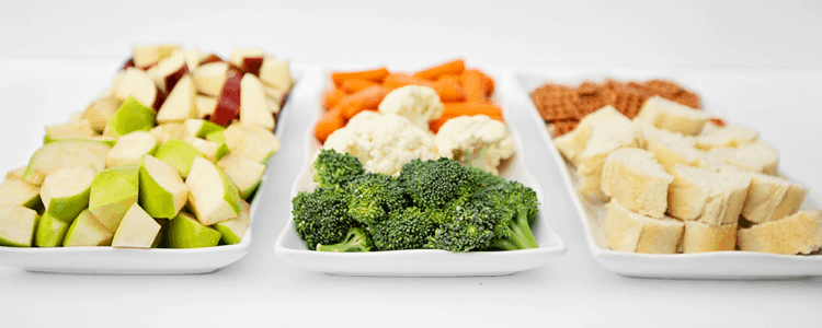 Cheese fondue dippers on three serving trays