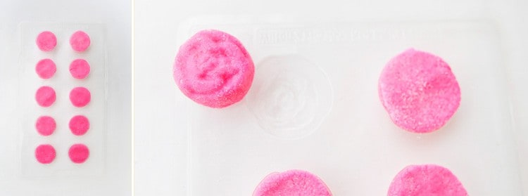 Cream cheese mints pressed into molds and released showing rose mold shape