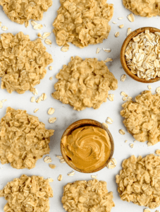 No Bake Peanut Butter Oatmeal Cookies with Bowls of Oatmeal and Peanut Butter