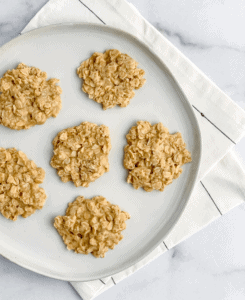 No Bake Peanut Butter Oatmeal Cookies on Plate with White Towel