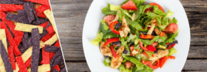 Tortilla Strips on Salad Greens with Chicken, Red Peppers, and Tomatoes