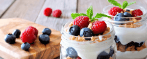 Yogurt Parfaits with Yogurt, Berries, and Mint Garnish