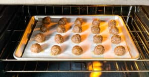 Meatballs on a Baking Sheet in the Oven