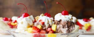 Banana Split with Fruit, Whipped Cream, and Cherries on Top