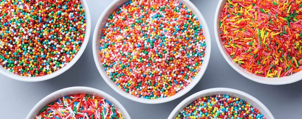 Variety of Sprinkles in White Bowls