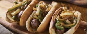 Grilled Bratwursts on Buns with Onions and Peppers