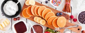 Pancakes Toppings Bar with Spread of Pancakes and Various Toppings