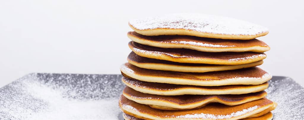 Pancakes Topped with Powdered Sugar