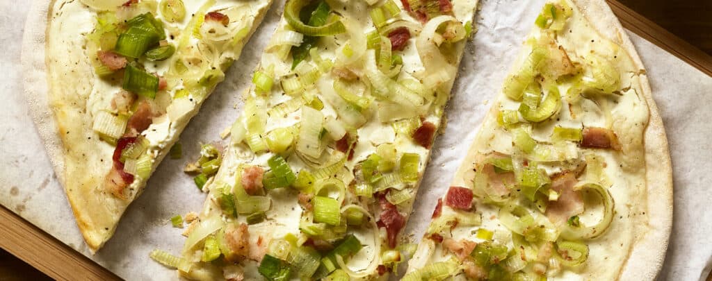 Leeks on Sliced Pizza