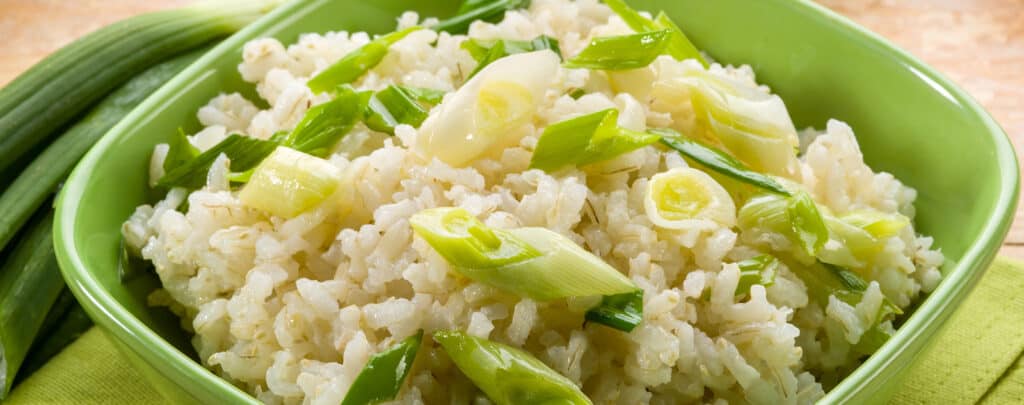 Leeks in Rice in Green Bowl