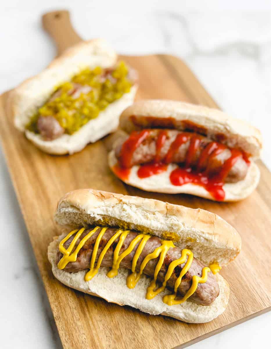 How to Cook Brats in the Oven - Brats with Relish, Ketchup, and Mustard