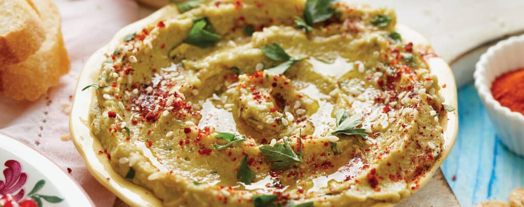 Avocado Hummus in a Bowl Topped with Chives