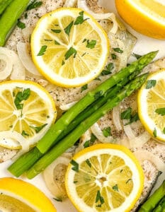 Baked Trout Fillet with Lemon, Herbs, and Asparagus