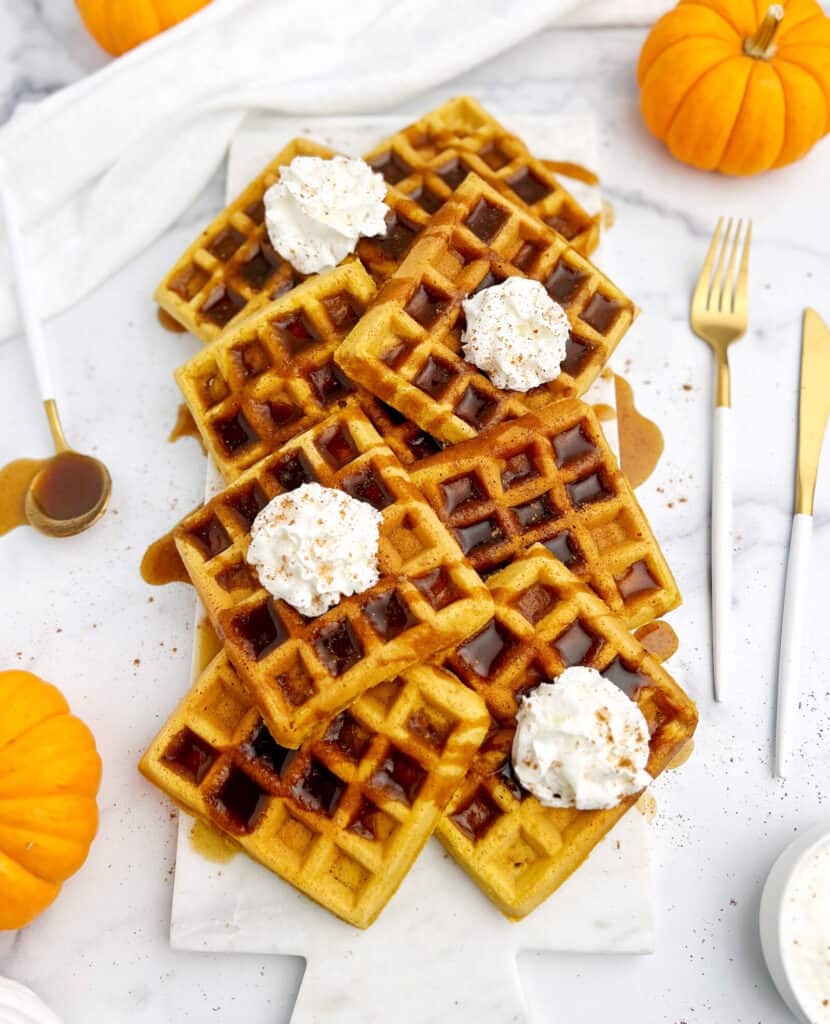 Pumpkin Waffles with Whipped Cream, Syrup, and Pumpkin Spice