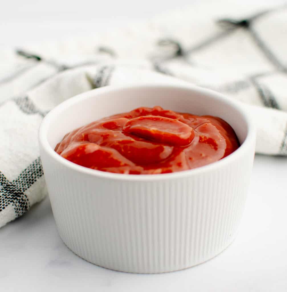 Homemade Cocktail Sauce in Bowl with Towel