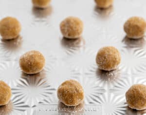 Rolled Dough Balls on Cookie Sheet Close Up