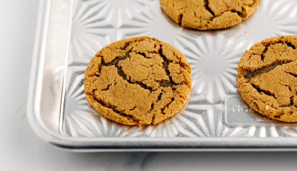 Baked Molasses Cookies on Cookie Sheet