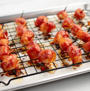Cooking Bacon Wrapped Water Chestnuts with Sauce on Baking Rack