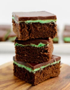Stack of Mint Chocolate Brownies on Wooden Surface