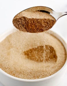 Cinnamon Sugar in White Bowl with Spoon
