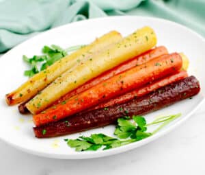 Honey Roasted Carrots on White Oval Platter with Parsley