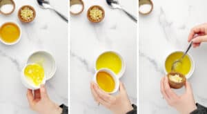 Mixing Together Honey Butter Garlic Sauce in Small White Bowl on Marble Countertop