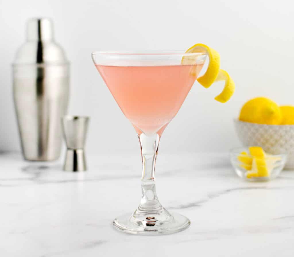 Pink Cocktail with Lemon Twist