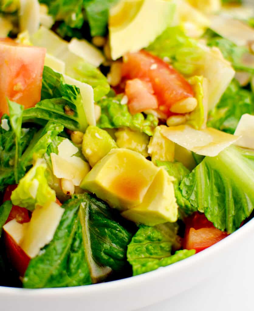 Avocado Tomato Romaine Salad in Bowl with Dressing