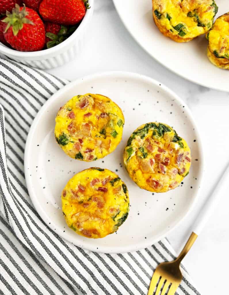 Egg Bites on a Plate with Napkin and Fork