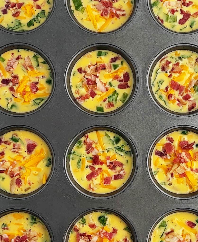 Closeup of Final Egg Mixture with Toppings in Muffin Tin