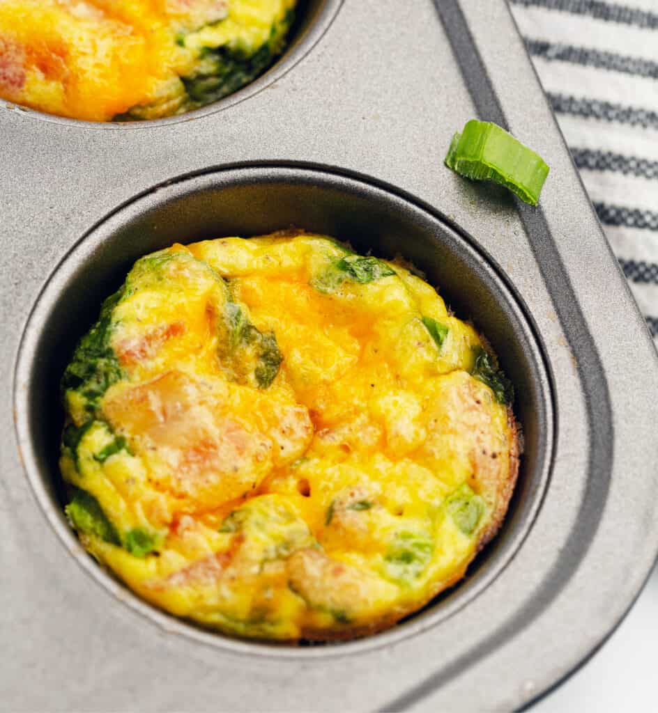 Closeup of One Egg Bite in Muffin Tin