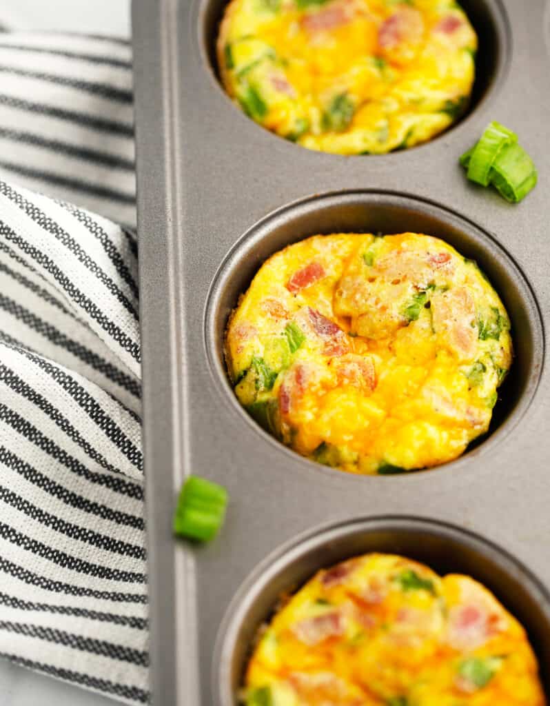 Closeup of Three Egg Cups in a Muffin Tin