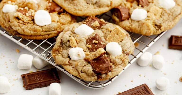 Smores Cookies with Marshmallows, Chopped Chocolate Bar, and Graham Crackers on Cooling Rack