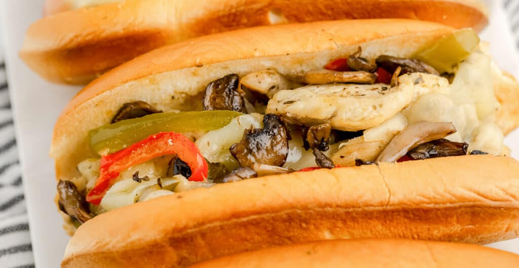 Closeup Side View of Cheesesteak Sandwich with Chicken