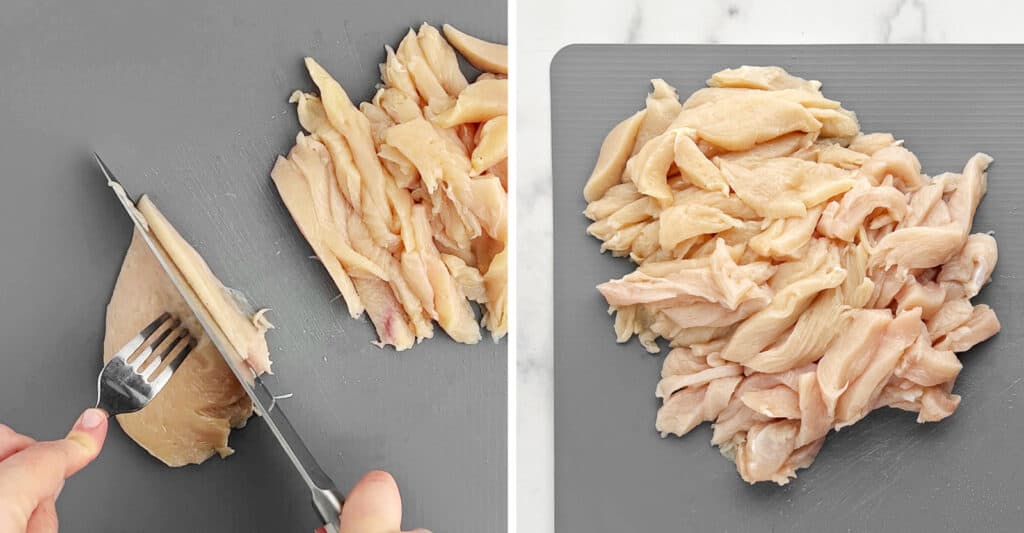 Chopping the Chicken on Cutting Board with Knife