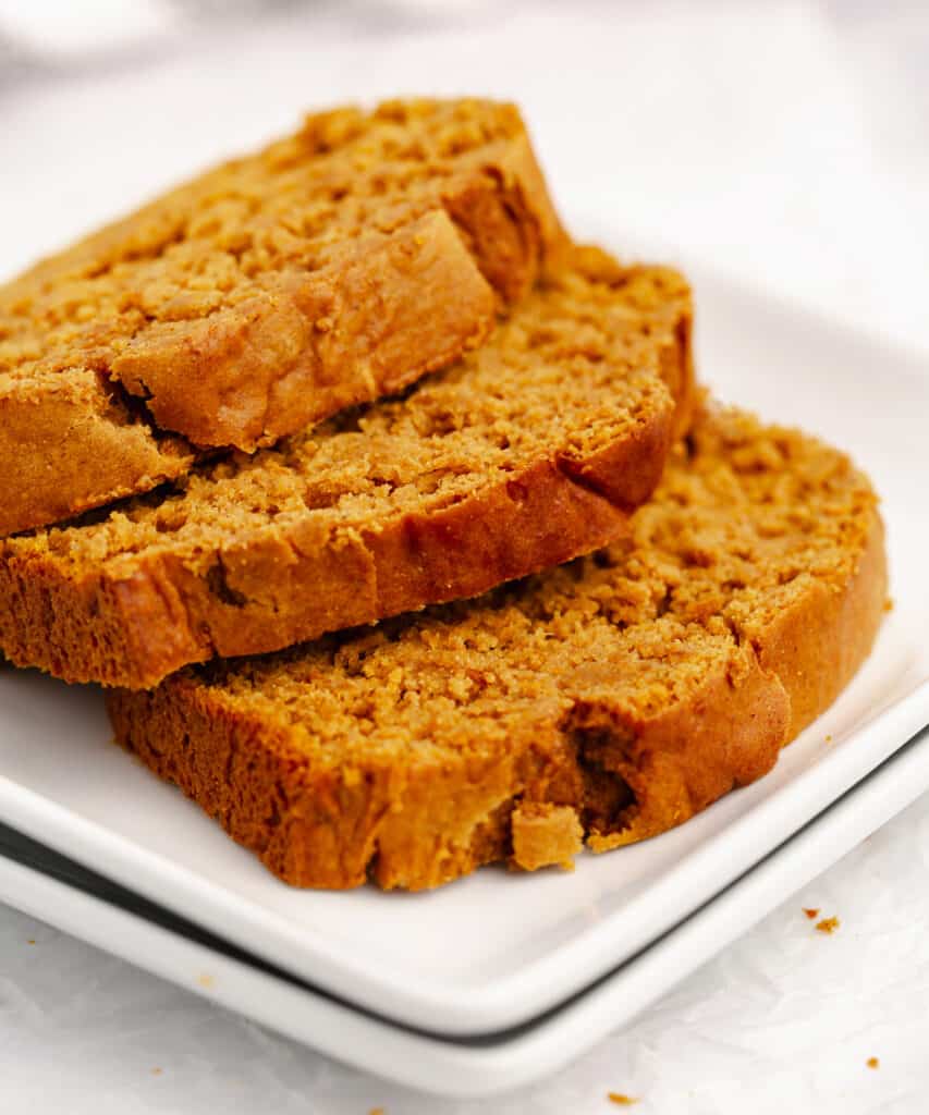 Slices of Pumpkin Bread on White Plates