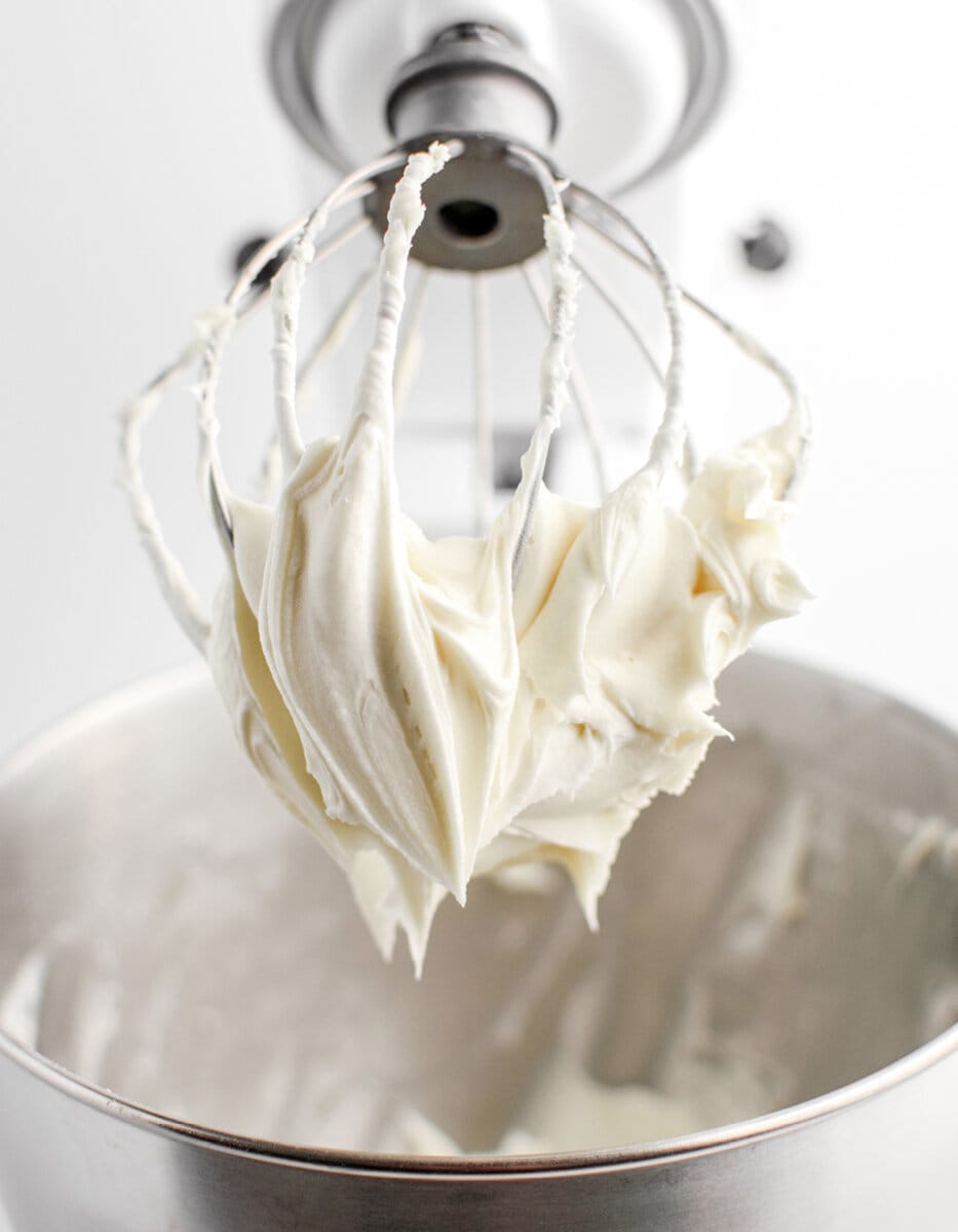 Easy Cream Cheese Frosting on Whisk of Stand Mixer