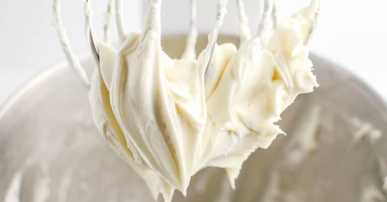 Easy Cream Cheese Frosting on Whisk of Stand Mixer