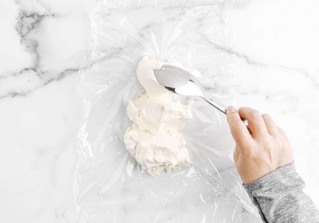 Spoon on Frosting to Plastic Wrap