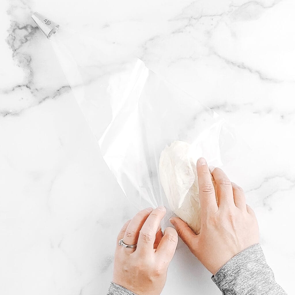 Things bakers know: A glass and a straight edge make piping bags mess-free