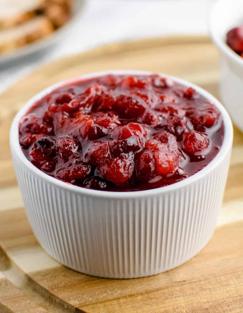 Cranberry Sauce in Bowl on Wooden Surface
